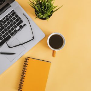 Notebook and Laptop on Work Desk