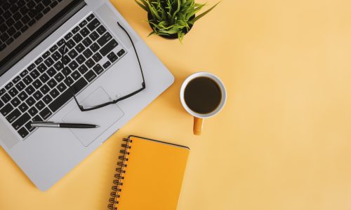 Notebook and Laptop on Work Desk